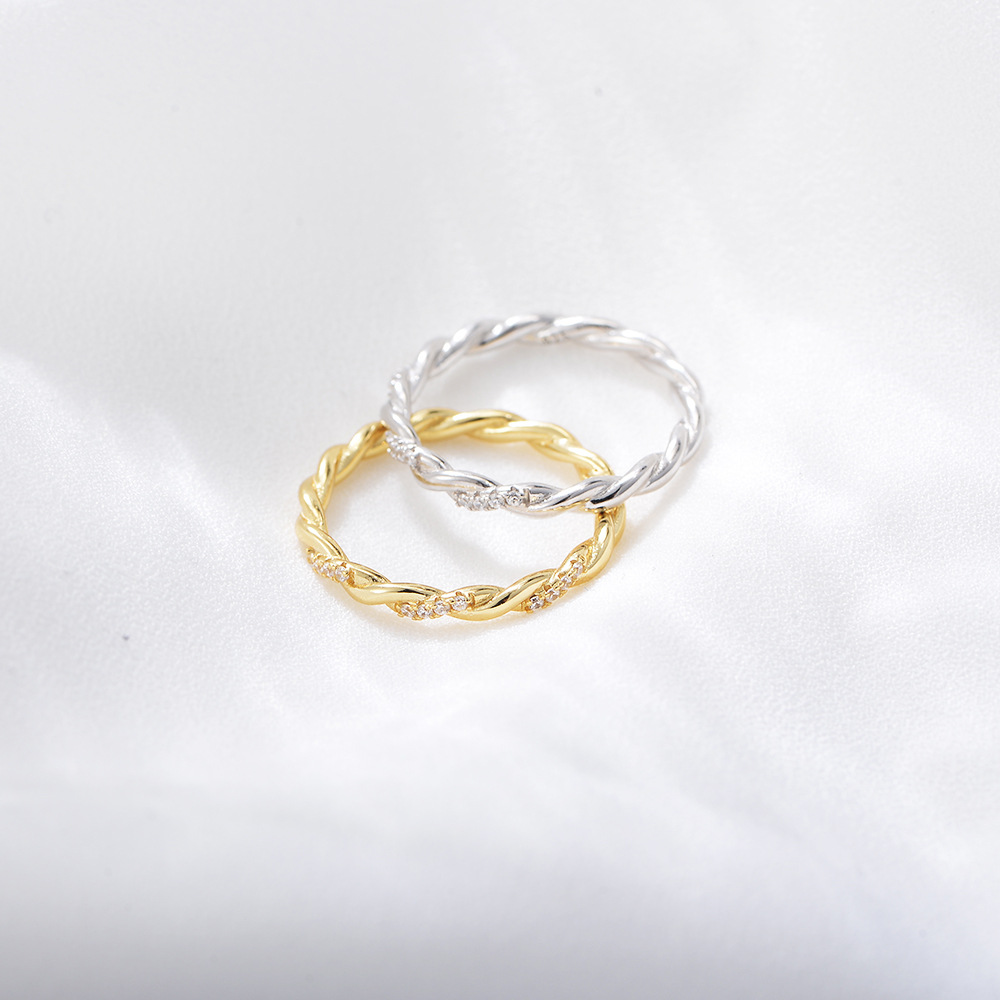 S925 sterling silver twisted braided ring for women, a unique and sophisticated design, featuring diamond accents.