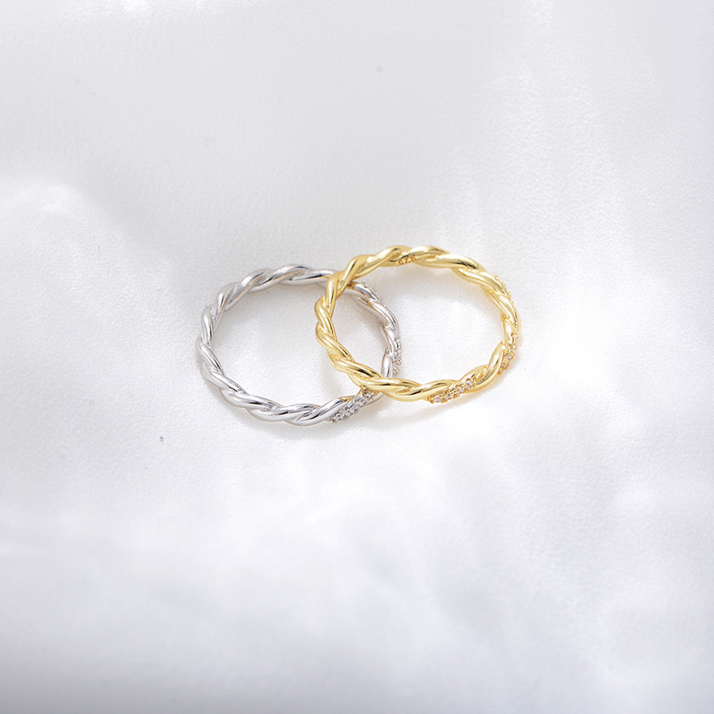 S925 sterling silver twisted braided ring for women, a unique and sophisticated design, featuring diamond accents.