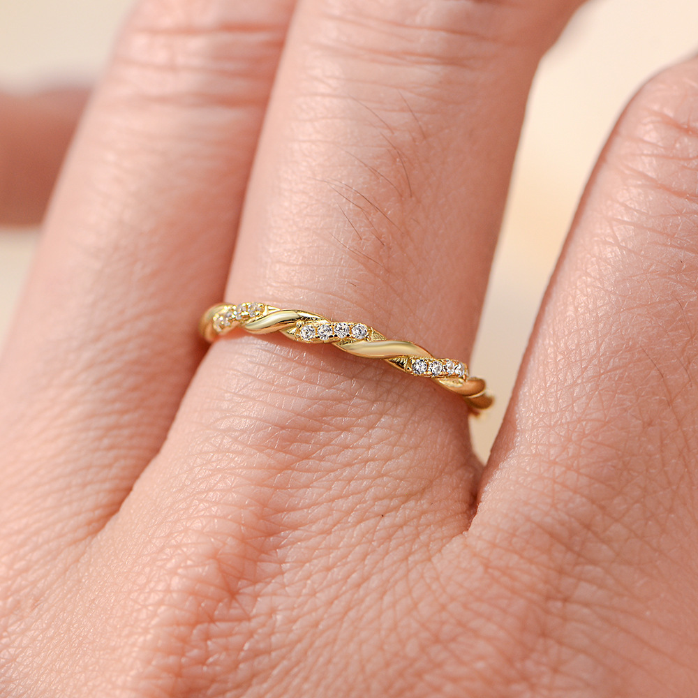 S925 sterling silver twisted braided ring for women, a unique and sophisticated design, featuring diamond accents.