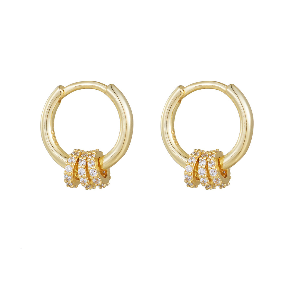 A pair of exquisite diamond-encrusted small hoop sterling silver drop earrings with a minimalist, trendy, and fashionable style.