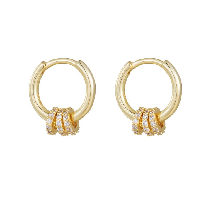 A pair of exquisite diamond-encrusted small hoop sterling silver drop earrings with a minimalist, trendy, and fashionable style.