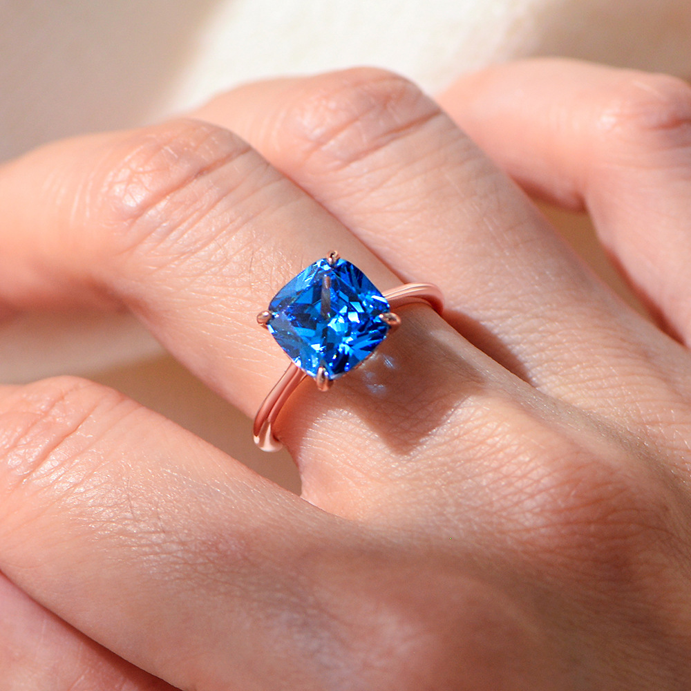 Blue cushion-shaped 10*10 zircon sterling silver ring plated with rose gold, women's luxury European and American style gemstone quality.