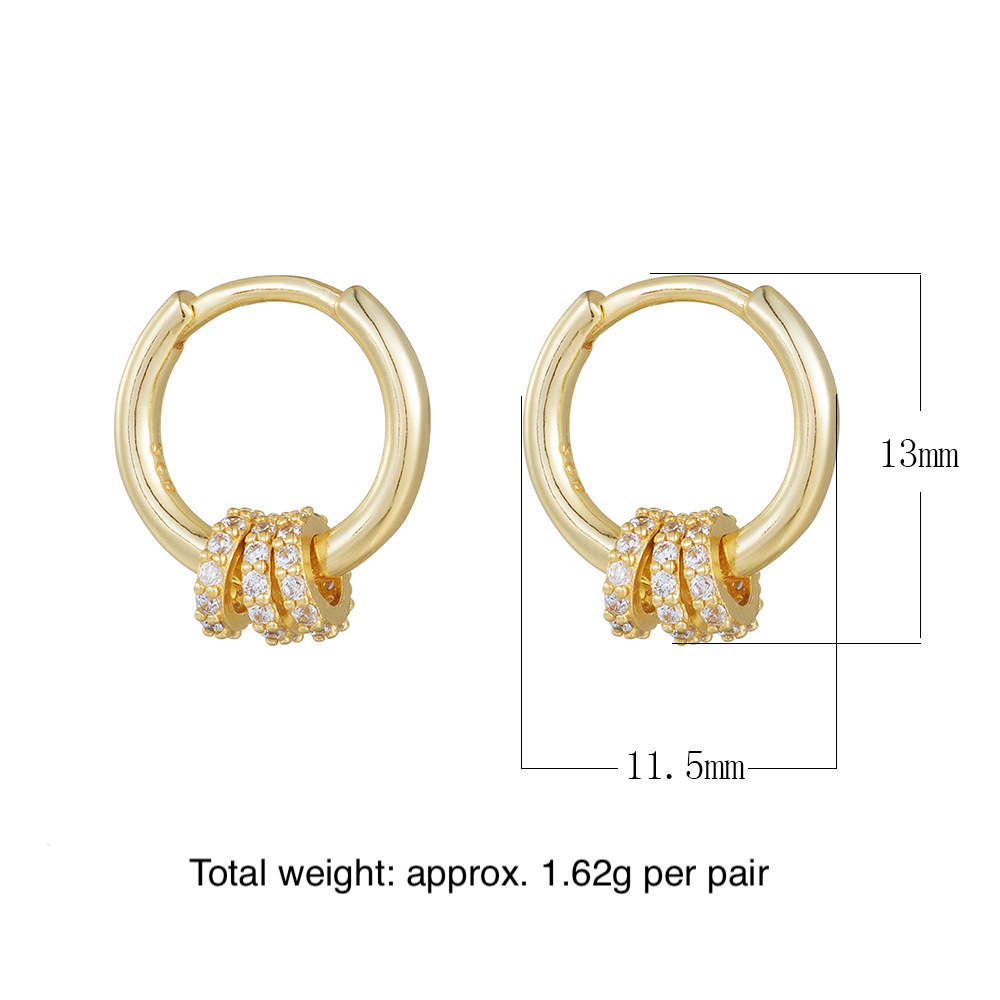 A pair of exquisite diamond-encrusted small hoop sterling silver drop earrings with a minimalist, trendy, and fashionable style.